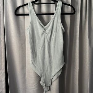 Mint green body suit